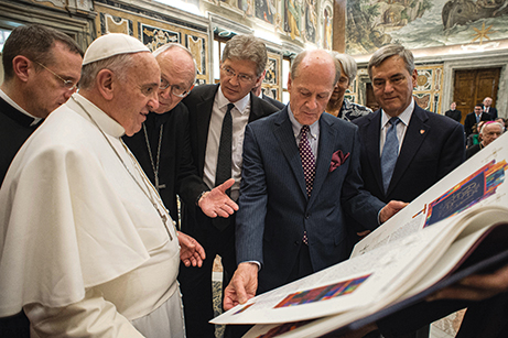 Donald Jackson presents the Letters and Revelation volume to Pope Francis at the Vatican.