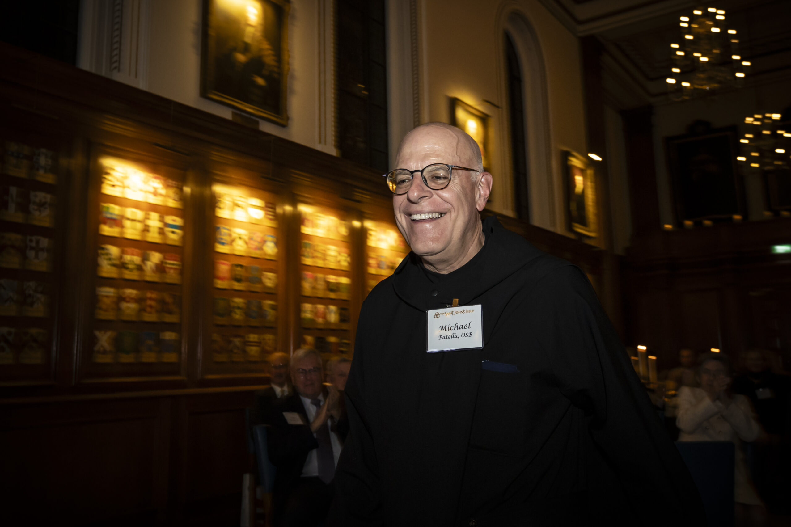 Patella receives the Pax Christi Award, Saint John’s Abbey and University’s highest honor award, along with the other creators of The Saint John’s Bible, in November 2023.
