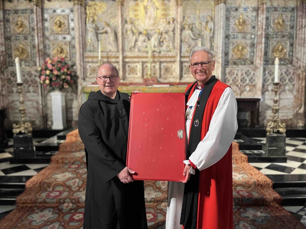 Fr. Eric Hollas (left) pictured with Dean Christopher Cocksworth (right) in St. George's Chapel in Windsor Castle.