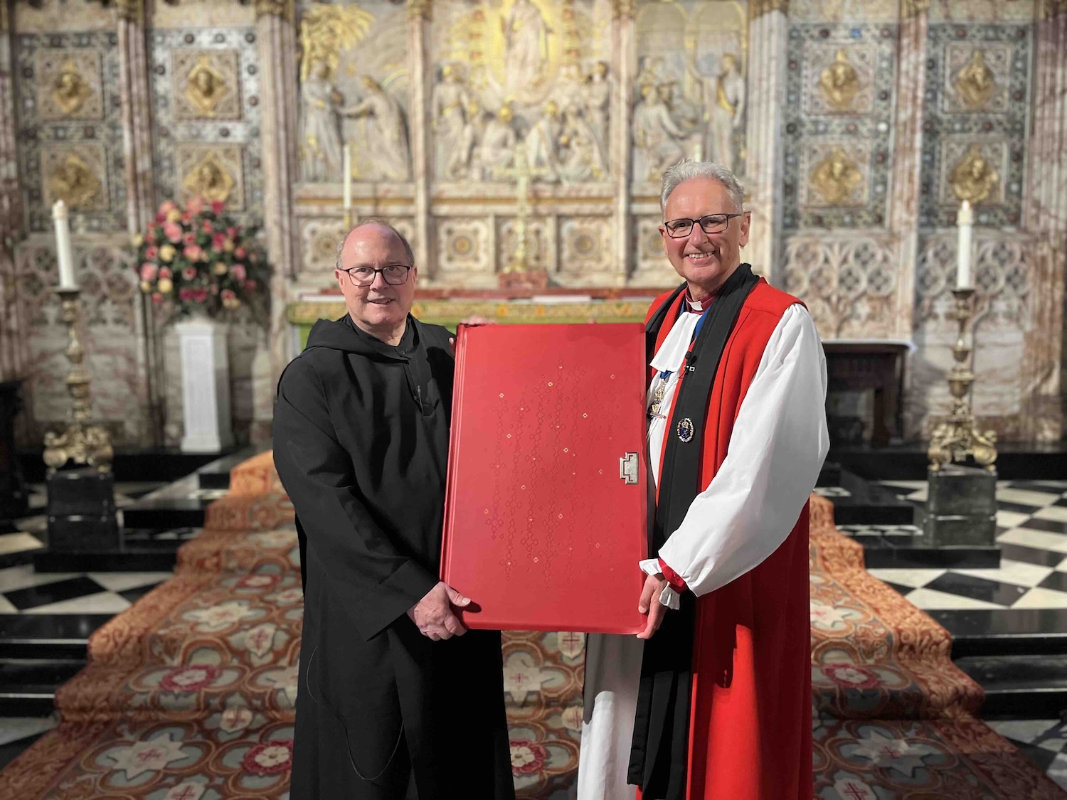 Fr. Eric Hollas (left) pictured with Dean Christopher Cocksworth (right) in St. George's Chapel in Windsor Castle.