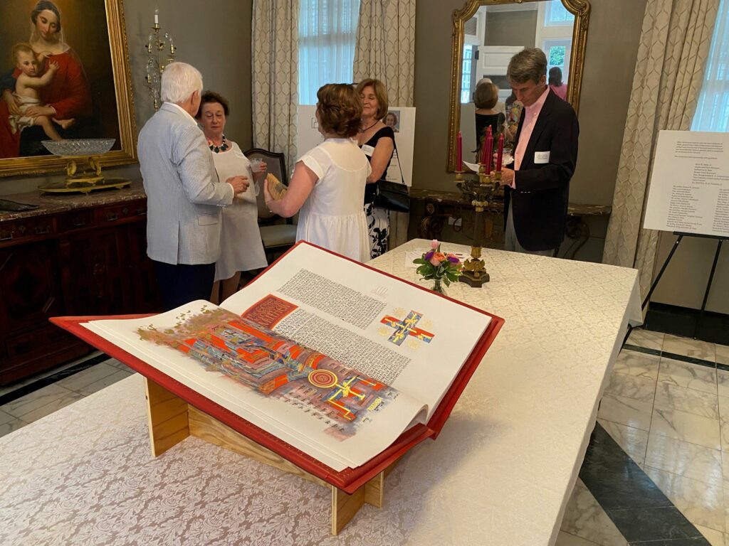 One of the seven volumes of the Heritage Edition gifted to St. Louis Cathedral lies open during the acceptance celebration event held in May 2025. 