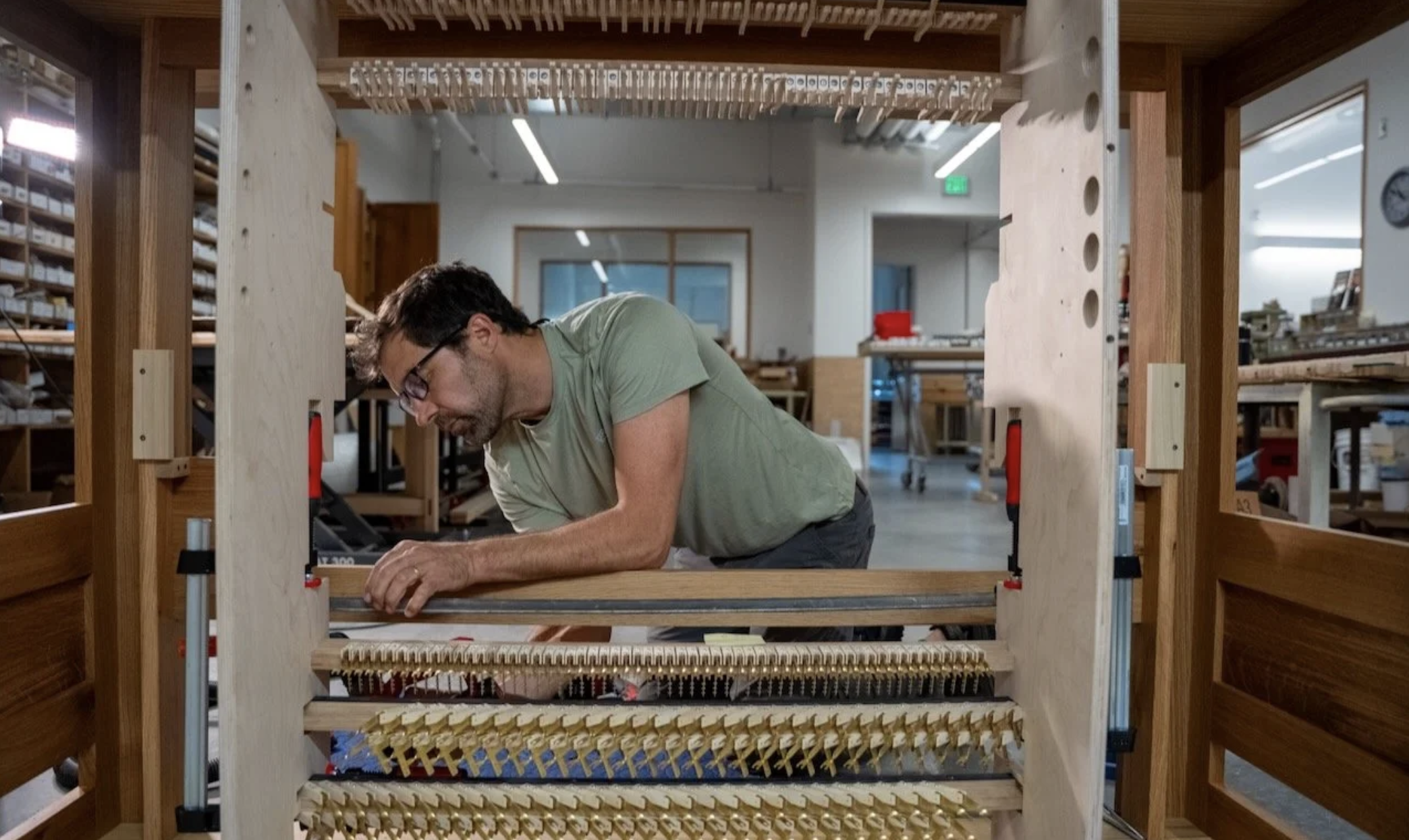 Saint John’s Abbey Organ Builder, Christian Metzler, working on a console. 